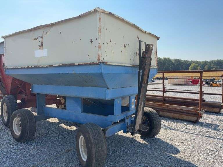 DMI E280 Gravity Wagon, Tires are Worn but Hold Air, Grain Door does Operate,