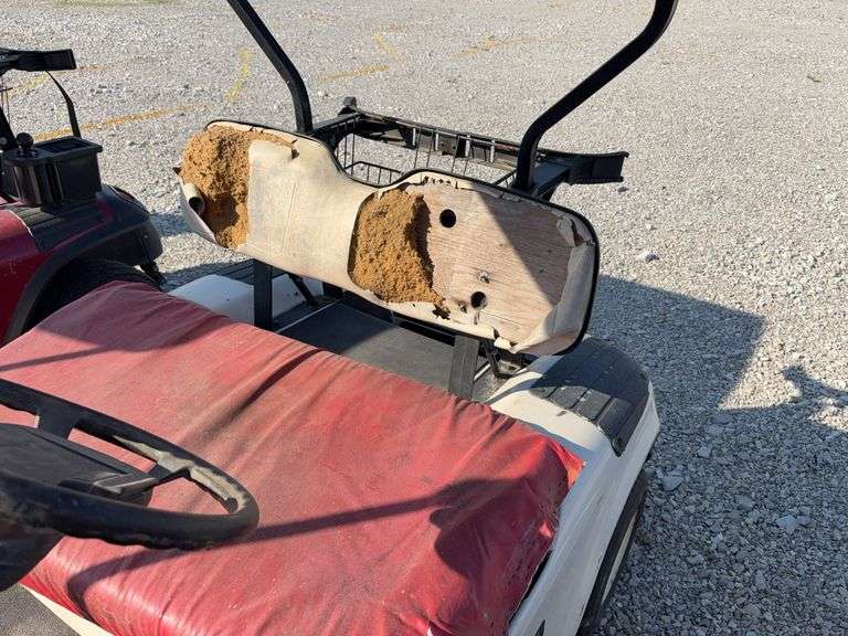 E-Z-GO Gas Golf Cart, Seats are Torn and Ripped, Bottom Cushion has Vinyl Laying on top of Seat, Unknown Condition, Tires have Fair Tread, Canopy Roof,