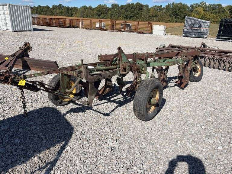 John Deere 4-14 Pull Type Plow, 2 tires hold air and 1 doesn’t hold air, no hydraulic cylinder,