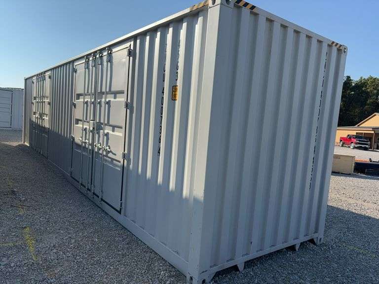 40’ WUXI 2 Side Doors and 1 Back Door Container, 40' long x 8' wide,
1 ea. Back Doors measures 102" tall X 92" wide,
2 ea. Side Doors  measures  98" tall X 110” wide,
inside dimension 89” wide,
Tie down anchors on inside of container,
Minor floor scratches on inside, minor wall scratches and dents, 
All doors have weatherstripping, 
1 time use,
Has vents on side walls, 
Container # ZNCU 400736 4