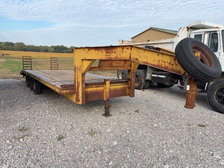 (TITLE) 24’ Gooseneck Trailer, 15 Ton Capacity, Triple Axles Estimated 5 Ton Each, Tires have 40% tread left, tires do hold air, Wood deck is in decent Shape, 2 fold down ramps, 8’ wide deck,