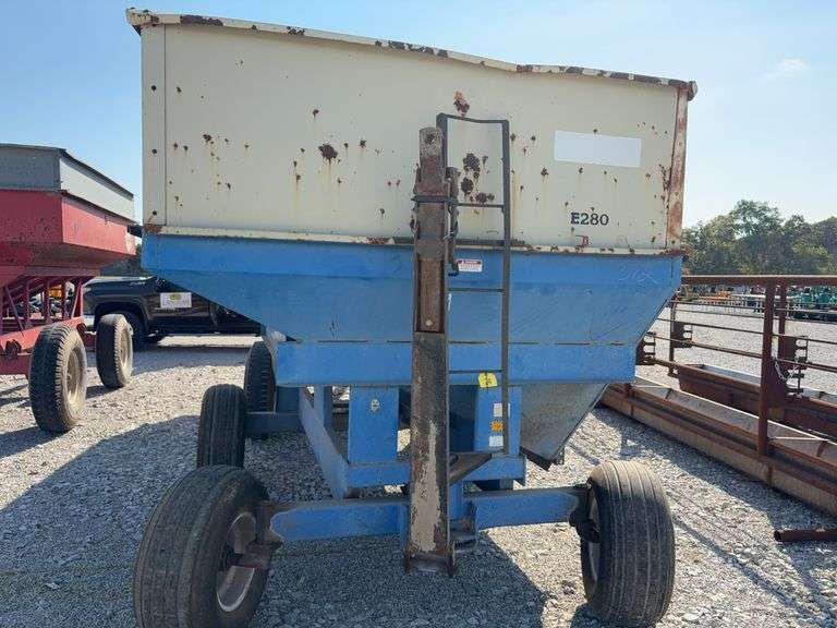 DMI E280 Gravity Wagon, Tires are Worn but Hold Air, Grain Door does Operate,