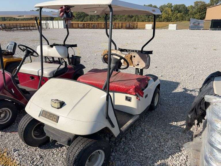 E-Z-GO Gas Golf Cart, Seats are Torn and Ripped, Bottom Cushion has Vinyl Laying on top of Seat, Unknown Condition, Tires have Fair Tread, Canopy Roof,