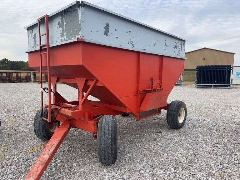300 Bushel Gravity Wagon, Lights, 12.5 L 16 Flotation Tires, Extending Tongue, Galvanized Side Boards, Repainted Orange, 8 Hole Hubs, Rocking Bolster On Front, Nice Wagon