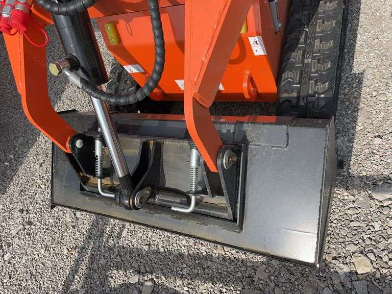 Unused Wuxi Landhero Mini Skid Steer Loader, Model # LDH-T460, 23 HP Gas Engine, Dumping Height 60”, Rubber Tracks 7” wide, 39” Wide Quick Attach Smooth Bucket, Remote Hydraulics on Loader Arms,