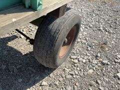 John Deere Wood Wagon, Hydraulic Dump w/ Cylinder, 24” Side Boards, 14’ long x 7’ wide, Front Side Board Has Broken Boards, Back Side Board is warped, Worn Tires That Hold Air.