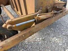 Eversman Earthmover 2 1/2 yd Scraper, Good Cutting Edge, Tires hold Air, Hydraulic Hoses are Cracked, Cylinder on left side shows small leak,