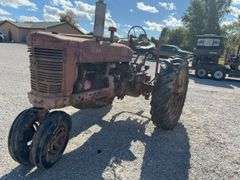 Farmall M, Starts and Runs, Dead Battery, Rear Hydraulics, 540 PTO, Paint is Faded with Surface Rust, Tires Hold Air, Front Wheels have weights, Rear Wheels have weights,