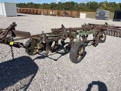 John Deere 4-14 Pull Type Plow, 2 tires hold air and 1 doesn’t hold air, no hydraulic cylinder,
