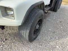 (TITLE) 1993 Freightliner Dump Truck FL 80, Title in Hand, Allison Auto Shift, Cummins Diesel 8.3, Automatic, Starts and Runs driven to Auction Yard, Rebuilt Hoist Cylinder 2024, Brake Work Done 2025, No A/C, Odometer does not work, Hood is Cracked, hole In Dump Bed , Idles Smooth, 22.5 Deep Tread Rears, Air Ride, Some Motor Work, Sleeves/Cylinder, Injectors And Pump Rebuilt, Air Leak under Dash, Former City Truck.