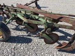 John Deere 4-14 Pull Type Plow, 2 tires hold air and 1 doesn’t hold air, no hydraulic cylinder,