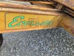 Eversman Earthmover 2 1/2 yd Scraper, Good Cutting Edge, Tires hold Air, Hydraulic Hoses are Cracked, Cylinder on left side shows small leak,