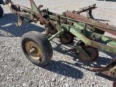 John Deere 4-14 Pull Type Plow, 2 tires hold air and 1 doesn’t hold air, no hydraulic cylinder,