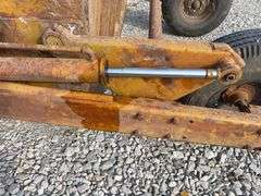 Eversman Earthmover 2 1/2 yd Scraper, Good Cutting Edge, Tires hold Air, Hydraulic Hoses are Cracked, Cylinder on left side shows small leak,