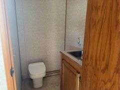 (TITLE) Auction Clerking Trailer, 2000 Model, Star Fire, Clerking Window/ Counter On Both Sides, Air Conditioner Needs Work, Lights Work,Bathroom And Propane Furnace, Storage Cabinets, Clean Low Mile Trailer. Good Tires, No Water Leak Marks On Ceiling, Electric Jack, 2 5/16 “ Ball Hitch