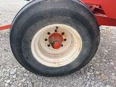 300 Bushel Gravity Wagon, Lights, 12.5 L 16 Flotation Tires, Extending Tongue, Galvanized Side Boards, Repainted Orange, 8 Hole Hubs, Rocking Bolster On Front, Nice Wagon