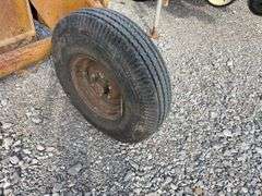 Eversman Earthmover 2 1/2 yd Scraper, Good Cutting Edge, Tires hold Air, Hydraulic Hoses are Cracked, Cylinder on left side shows small leak,