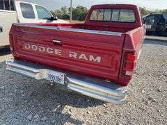 (TITLE) 1988 Dodge 2 Door 4wd Pick Up, 318 V 8 Gas Engine, Title in Hand, 58004 miles, Back Fender Wells Rusted Out, Dents and Dings on Both Sides of Truck, Tailgate Dented and Does Not Open, Passenger Side missing some Trim Pieces, Automatic, AM/FM Radio, AC/Heat, AC not Very Cold, Vinyl Floors, 8 cylinder Gas Engine, New Battery , Newer Tires, Starts and Runs, Driven to Auction Site, Lights Work, Formerly Owned By Dan Balla from Donnellson, He Farmed And Would Drive Around The Community Real Slow Visiting Neighbors. Mileage Is Original.