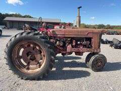 Farmall M, Starts and Runs, Dead Battery, Rear Hydraulics, 540 PTO, Paint is Faded with Surface Rust, Tires Hold Air, Front Wheels have weights, Rear Wheels have weights,