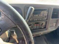 (TITLE) 2005 Chevrolet C2500 HD, 4 Door, 2 Wheel Drive, 140,267 Miles, Automatic, Knapheide Tool Box all Tool Box Doors Need Work, Rust on Lower Panels on Side of Truck, Bottom Sides of Tool Box Have Rust, Tires are Worn, Cloth Interior, Hole in Driver Seat, AC/Heat unknown Condition Vent selector Switch doesn’t Work, AM/FM/CD, No Backseat, Power Windows and Locks, Cruise Control,