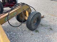 Eversman Earthmover 2 1/2 yd Scraper, Good Cutting Edge, Tires hold Air, Hydraulic Hoses are Cracked, Cylinder on left side shows small leak,