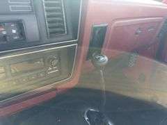(TITLE) 1988 Dodge 2 Door 4wd Pick Up, 318 V 8 Gas Engine, Title in Hand, 58004 miles, Back Fender Wells Rusted Out, Dents and Dings on Both Sides of Truck, Tailgate Dented and Does Not Open, Passenger Side missing some Trim Pieces, Automatic, AM/FM Radio, AC/Heat, AC not Very Cold, Vinyl Floors, 8 cylinder Gas Engine, New Battery , Newer Tires, Starts and Runs, Driven to Auction Site, Lights Work, Formerly Owned By Dan Balla from Donnellson, He Farmed And Would Drive Around The Community Real Slow Visiting Neighbors. Mileage Is Original.