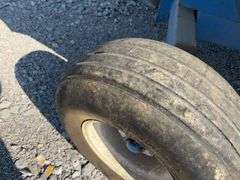 DMI E280 Gravity Wagon, Tires are Worn but Hold Air, Grain Door does Operate,