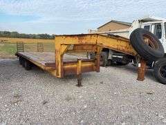 (TITLE) 24’ Gooseneck Trailer, 15 Ton Capacity, Triple Axles Estimated 5 Ton Each, Tires have 40% tread left, tires do hold air, Wood deck is in decent Shape, 2 fold down ramps, 8’ wide deck,