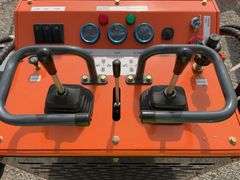 Unused Wuxi Landhero Mini Skid Steer Loader, Model # LDH-T460, 23 HP Gas Engine, Dumping Height 60”, Rubber Tracks 7” wide, 39” Wide Quick Attach Smooth Bucket, Remote Hydraulics on Loader Arms,