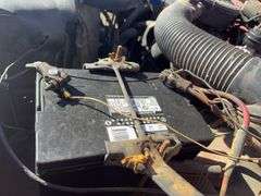 (TITLE) 1988 Dodge 2 Door 4wd Pick Up, 318 V 8 Gas Engine, Title in Hand, 58004 miles, Back Fender Wells Rusted Out, Dents and Dings on Both Sides of Truck, Tailgate Dented and Does Not Open, Passenger Side missing some Trim Pieces, Automatic, AM/FM Radio, AC/Heat, AC not Very Cold, Vinyl Floors, 8 cylinder Gas Engine, New Battery , Newer Tires, Starts and Runs, Driven to Auction Site, Lights Work, Formerly Owned By Dan Balla from Donnellson, He Farmed And Would Drive Around The Community Real Slow Visiting Neighbors. Mileage Is Original.