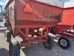 Killbros 350 Bushel Gravity  Wagon, Tires hold Air, Has Surface Rust, No holes in Floor, Hopper Door does work, Pulled to Auction Site, Sells With Hopper And Hydraulic Seed Auger.