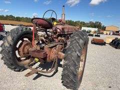 Farmall M, Starts and Runs, Dead Battery, Rear Hydraulics, 540 PTO, Paint is Faded with Surface Rust, Tires Hold Air, Front Wheels have weights, Rear Wheels have weights,