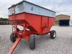 300 Bushel Gravity Wagon, Lights, 12.5 L 16 Flotation Tires, Extending Tongue, Galvanized Side Boards, Repainted Orange, 8 Hole Hubs, Rocking Bolster On Front, Nice Wagon