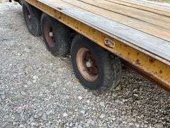 (TITLE) 24’ Gooseneck Trailer, 15 Ton Capacity, Triple Axles Estimated 5 Ton Each, Tires have 40% tread left, tires do hold air, Wood deck is in decent Shape, 2 fold down ramps, 8’ wide deck,