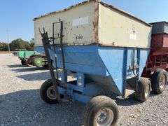 DMI E280 Gravity Wagon, Tires are Worn but Hold Air, Grain Door does Operate,
