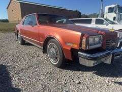 (TITLE)1979 Oldsmobile Toronado, Barn Find, Leo Brown Lumber Co Vandalia Illinois, Belonged To His Wife, Driven 23,000 Miles, 5.7 L Gas Engine, Automatic On Column, No Rust, Stored Inside, Need Plastic Trim (Front) Replaced, Excellent Upholstery (No Odor) Needs Head liner replaced, Needs Steering Wheel Replaced, Starts And Runs. Beautiful Original Automobile.Clean Title In Hand
