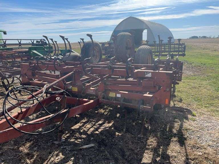 Kewanee Field Cultivator, 18’ Wide, Hydraulic Folding, Rolling Baskets in Back, Shovels Are Worn and Some Missing, 11L-15 SL Tires Fair Some Have Cracks, Hydraulic Lines Need Attention