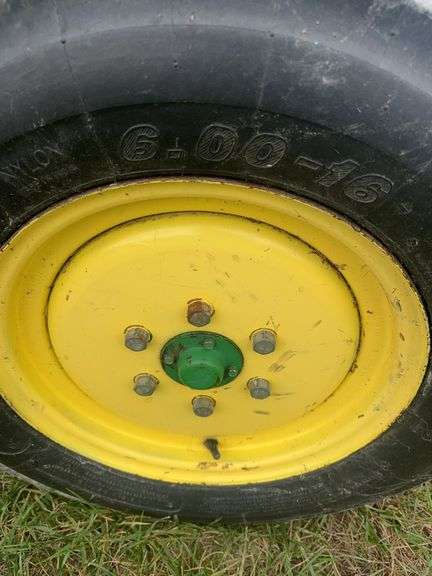 John Deere 990 Compact Tractor, Yanmar 40 HP 4 Cylinder Engine, ROPS,  14.9-24 Rear Tires 50% (Cracked), 6.00-16 Fronts 80%, Rear PTO, Category 1   3 Point Hitch, ROPS, Tachometer Works, Hour Meter Not Working, Fuel And Temp Gauges Working, 9 Forward Speeds, 3 Reverse Speeds, Strong Clutch , Brakes Work, Starts And Runs With No Know Issues, Power Steering 2 Wheel Drive