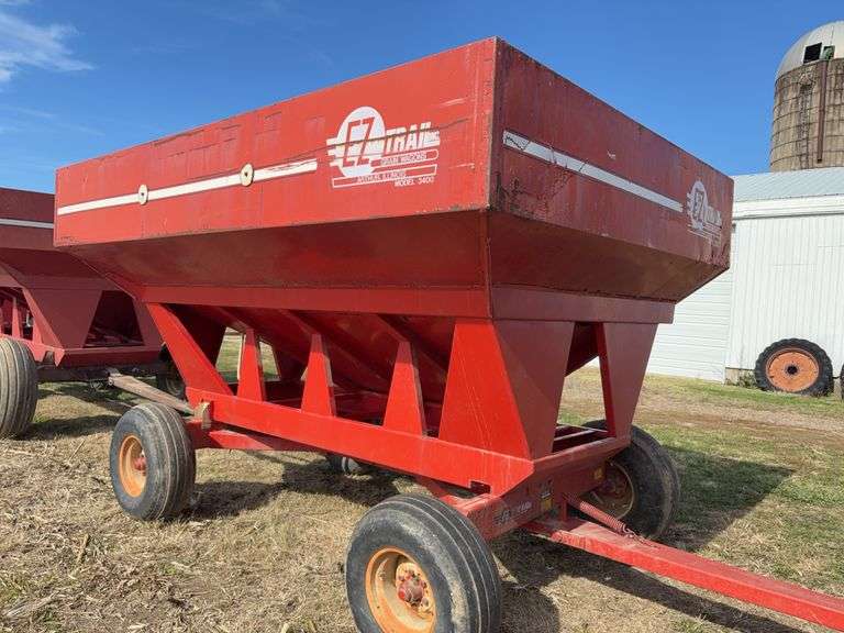 E-Z Trail Grain Wagon Model 3400, Hopper Door Does Operate, Tires Hold Air, 20% Tread Left, 300 Bushel, Rust on Front of Bed, Back of Bed has Dents,