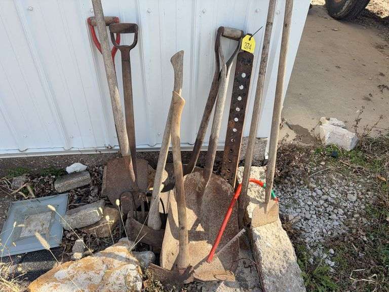 (2) Steel Grain Shovels, Barn Scraper, Maddox, Hoe, Axe, Short Handle Round Point Shovel, Long Handle 4 Tine Pitch Fork, Short Handle 4 Tine Pitch Fork, 3 pt Drawbar, Bow Saw