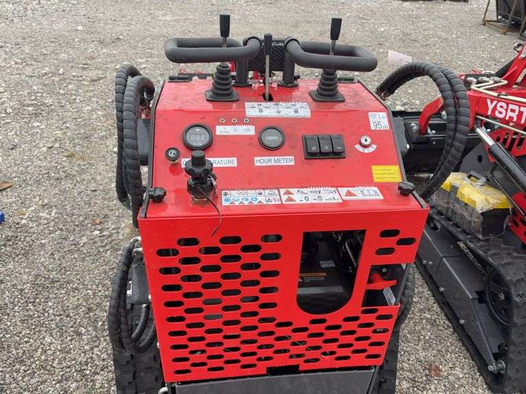 Unused AGT Stand On Skidsteer, Model YSRT14, Gas Engine, 31” Material Bucket, 420 CC (15hp) Engine. Headlights, Hydraulic Hookups on Boom, 6” wide Rubber Tracks,