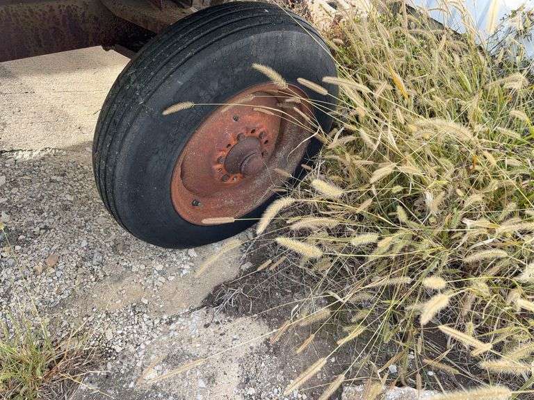 Hay Frame Wagon, 18’ Bed Length x 8’ Wide, Deck is Rotten, Steel Frame, Tongue has been extended, Tires are Dry Rotted, Steel Frame is rusted out by Back Axke,