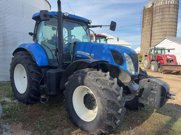2013 New Holland T7.235 Tractor, Serial # 001146431,  234 hp, Rear Tires 710/70R 38 with Good Tread, Front Tires 600/65R28 with Good Tread, 70% Rubber, 540 & 1000 PTO, 964 verified Hours, Front Wheel Assist, Quick Hitch, Starts and Runs with No Issues, Clean Cab Interior, LH Shuttle Shift, Heat/AC, AM/FM Radio, Engine: Tier 4A/Stufe 3B Emission Level, 4 Remotes, Requires DEF,  Full Power Shift 18 Gear Transmission, (10) 100# Front Weights