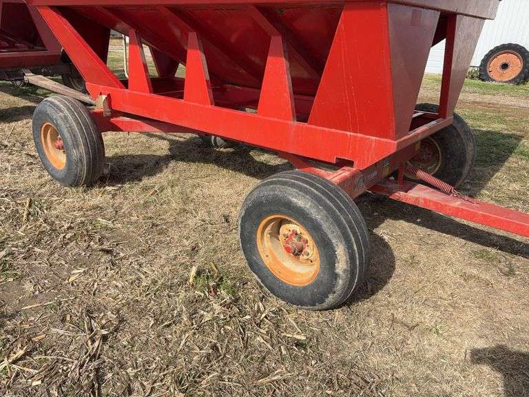 E-Z Trail Grain Wagon Model 3400, Hopper Door Does Operate, Tires Hold Air, 20% Tread Left, 300 Bushel, Rust on Front of Bed, Back of Bed has Dents,