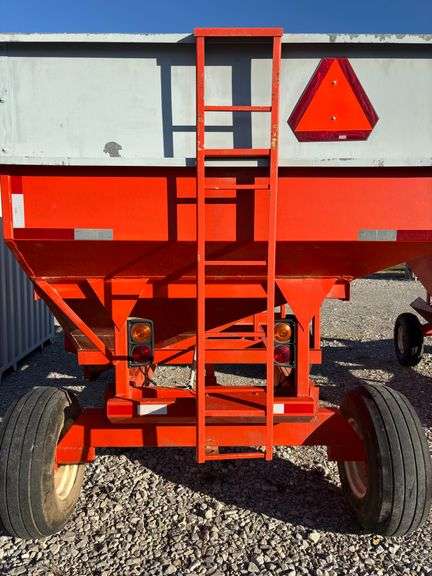 300 Bushel Gravity Wagon, Lights, 12.5 L 16 Flotation Tires, Extending Tongue, Galvanized Side Boards, Repainted Orange, 8 Hole Hubs, Rocking Bolster On Front, Nice Wagon