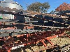 Kewanee Field Cultivator, 18’ Wide, Hydraulic Folding, Rolling Baskets in Back, Shovels Are Worn and Some Missing, 11L-15 SL Tires Fair Some Have Cracks, Hydraulic Lines Need Attention
