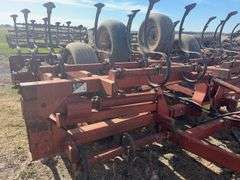 Kewanee Field Cultivator, 18’ Wide, Hydraulic Folding, Rolling Baskets in Back, Shovels Are Worn and Some Missing, 11L-15 SL Tires Fair Some Have Cracks, Hydraulic Lines Need Attention