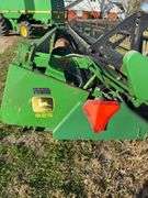 John Deere 925 Grain Head, Fits John Deere 9500 Combine, Fore/Aft Reel Cylinders, Has New Arm on Sickle Drive , Sickle Sections Good , Reel Has Composite Fingers, Stainless Pan, Poly Skids, Well Maintained Head, Header Cart IS NOT Included with Header.  See Lot #307A.