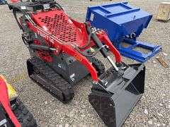 Unused AGT Stand On Skidsteer, Model YSRT14, Gas Engine, 31” Material Bucket, 420 CC (15hp) Engine. Headlights, Hydraulic Hookups on Boom, 6” wide Rubber Tracks,