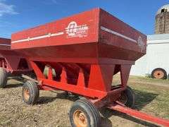 E-Z Trail Grain Wagon Model 3400, Hopper Door Does Operate, Tires Hold Air, 20% Tread Left, 300 Bushel, Rust on Front of Bed, Back of Bed has Dents,